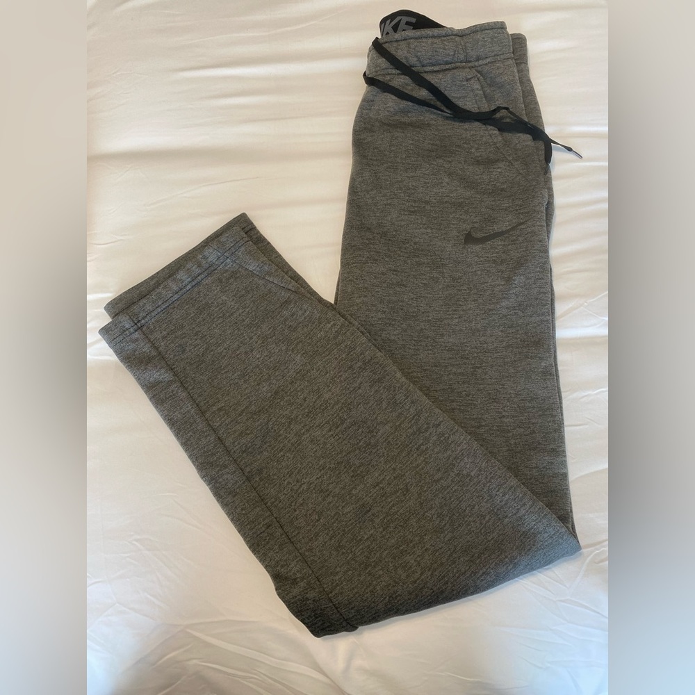 Mens small Nike sweatpants.  Gently used.  Dark grey.  Not joggers.